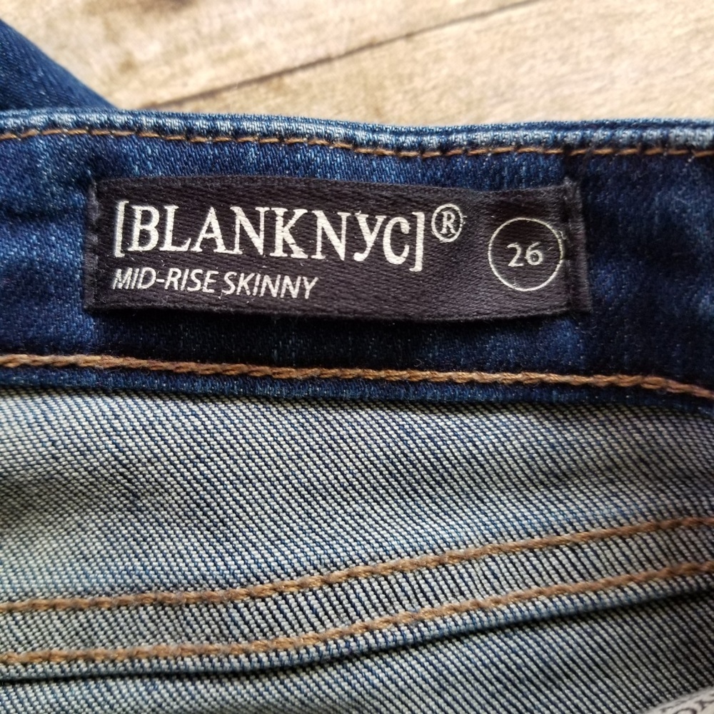 BLANK NYC DARK WASH DISTRESSED MID RISE SKINNY